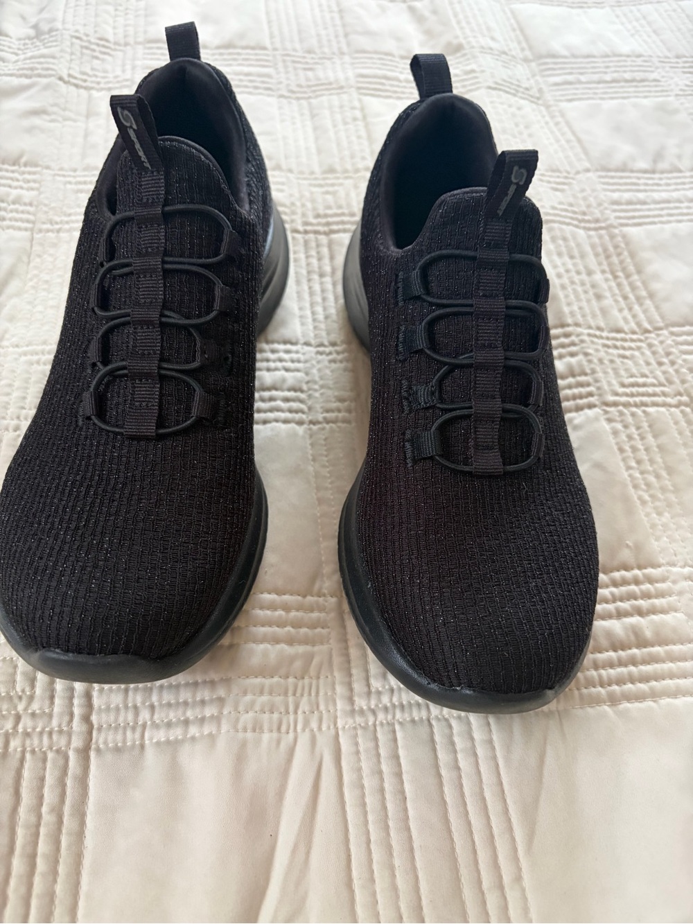 Skechers woman’s Black Slip-On Knit Athletic Sneakers